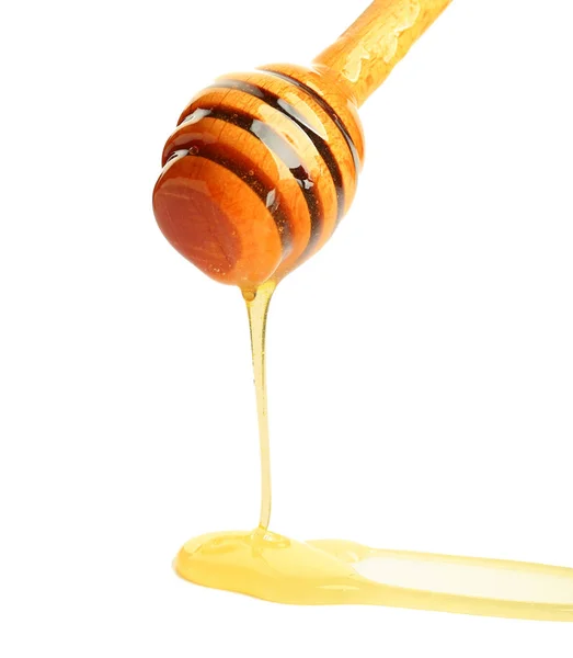 Wooden honey dipper on white background — Stock Photo, Image