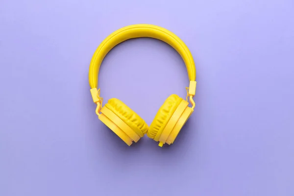 Modern headphones on color background — Stock Photo, Image
