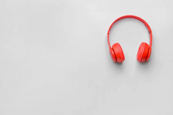 Modern headphones on light background — Stock Photo, Image