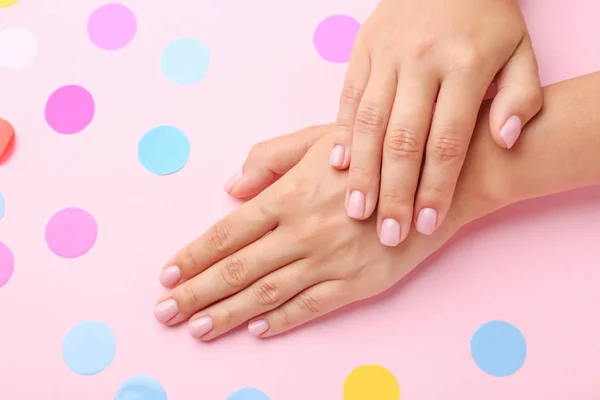 Female hands with beautiful manicure on color background — Stock Photo, Image