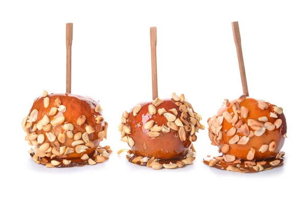 Tasty candy apples on white background — Stock Photo, Image