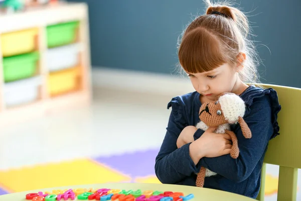 Little girl with autistic disorder in playroom — Stock Photo, Image