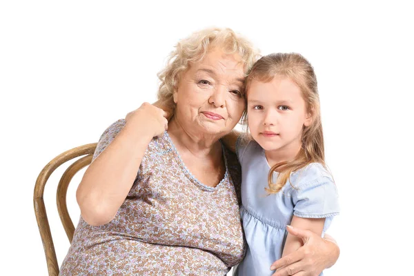 Linda niña con abuela sobre fondo blanco —  Fotos de Stock