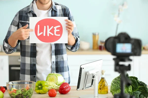 Food blogger recording video at home