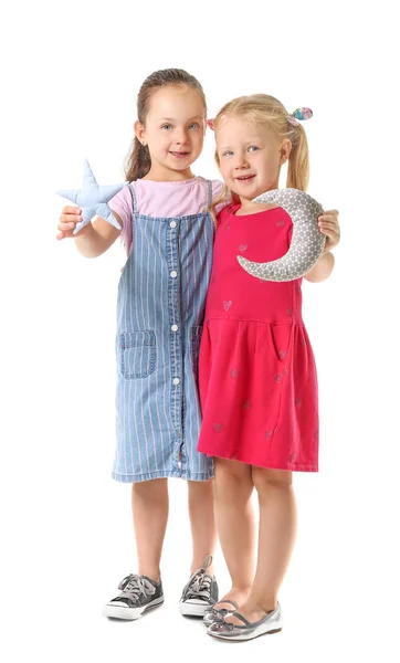 Meninas bonitos com brinquedos no fundo branco — Fotografia de Stock