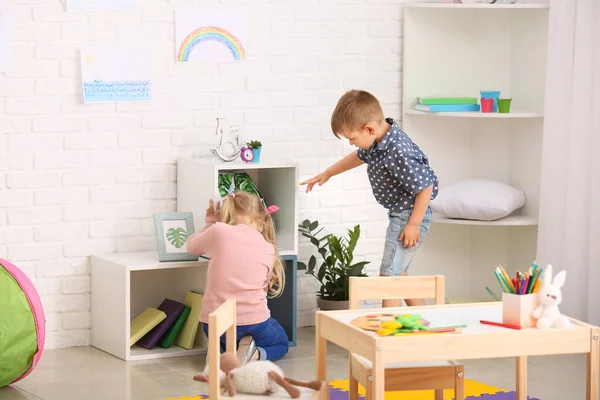 Cute little children playing in kindergarten — Stock Photo, Image