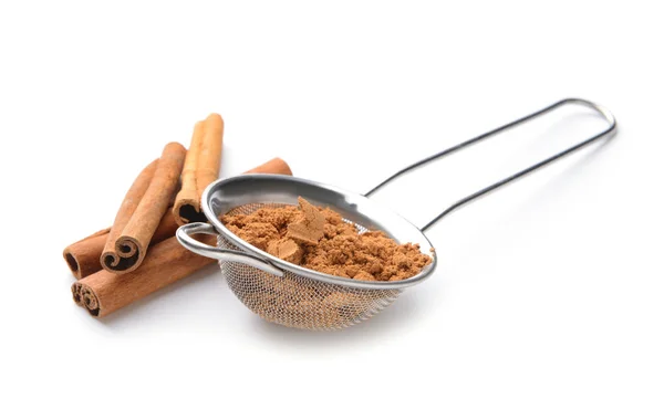 Aromatic cinnamon sticks and powder on white background — Stock Photo, Image