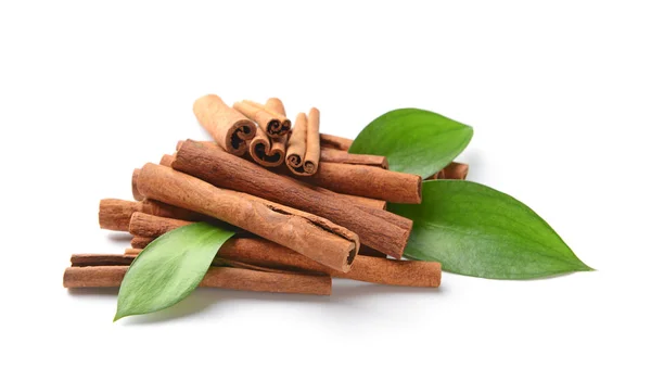 Aromatic cinnamon sticks on white background