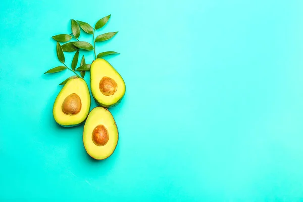 Fresh avocados on color background — Stock Photo, Image