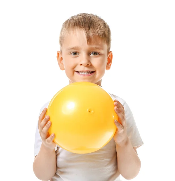 Menino bonito com balão de ar no fundo branco — Fotografia de Stock