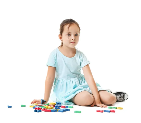 Cute little girl with letters on white background — Stock Photo, Image