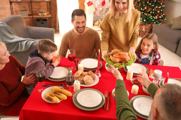 Happy family having Christmas dinner at home — Stock Photo, Image