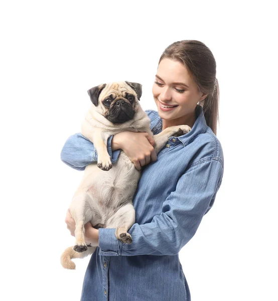 Beautiful young woman with cute pug dog on white background — Stock Photo, Image