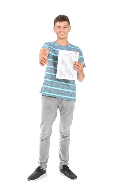 Niño feliz con los resultados de la prueba de la escuela sobre fondo blanco —  Fotos de Stock