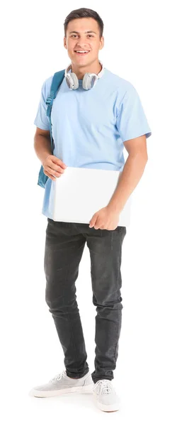 Портрет молодого студента з ноутбуком на білому тлі — стокове фото