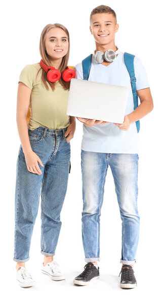 Portrait of young students with laptop on white background