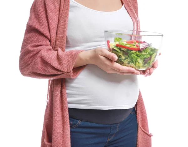 Beautiful pregnant woman with healthy salad on white background — Stock Photo, Image