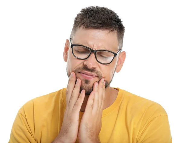 Man suffering from toothache against white background — Stock Photo, Image