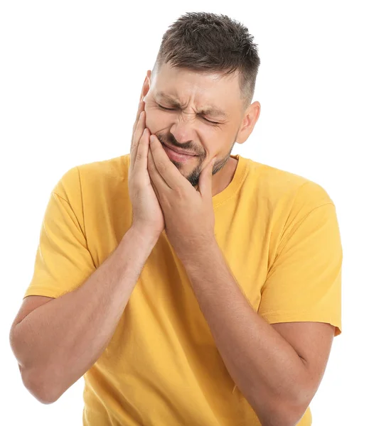 Man suffering from toothache against white background — Stock Photo, Image