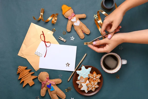 Woman making beautiful Christmas greeting card — Stock Photo, Image