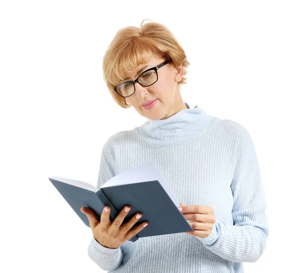 Portrait of beautiful middle-aged woman reading book on white background — Stock Photo, Image