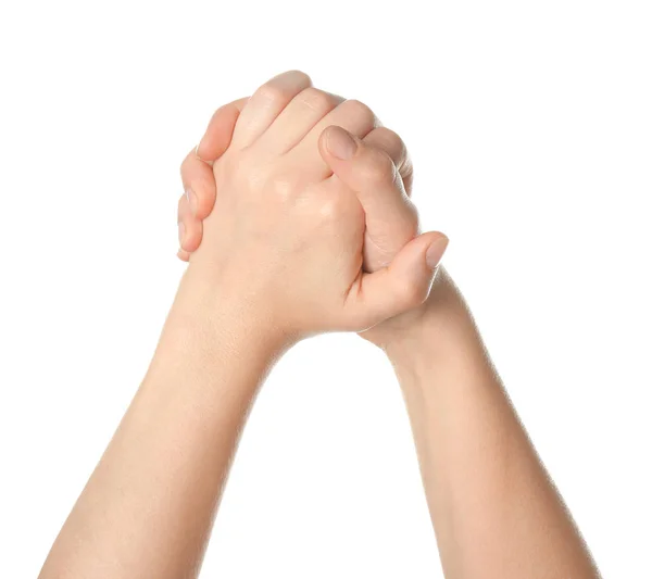 Woman holding hands together on white background — Stock Photo, Image