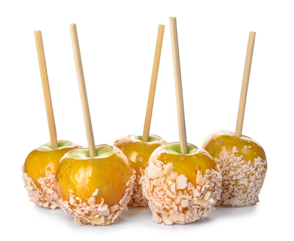 Tasty candy apples on white background — Stock Photo, Image