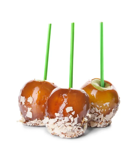 Tasty candy apples on white background — Stock Photo, Image