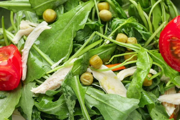 Tasty salad with arugula, closeup — Stock Photo, Image