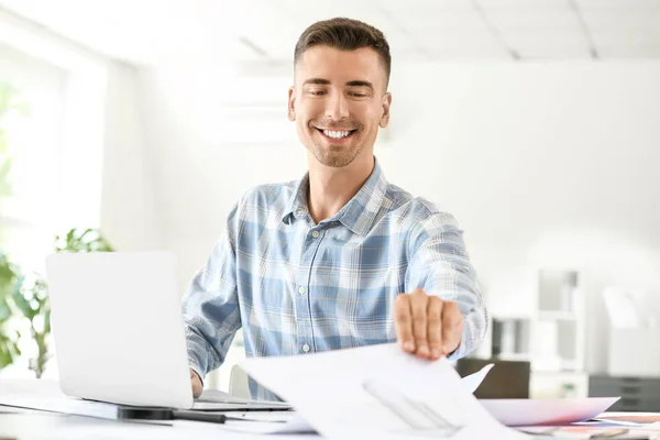 Handsome male architect working in office — Stock Photo, Image