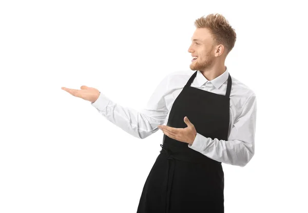 Frumos bucătar de sex masculin care arată ceva pe fundal alb — Fotografie, imagine de stoc