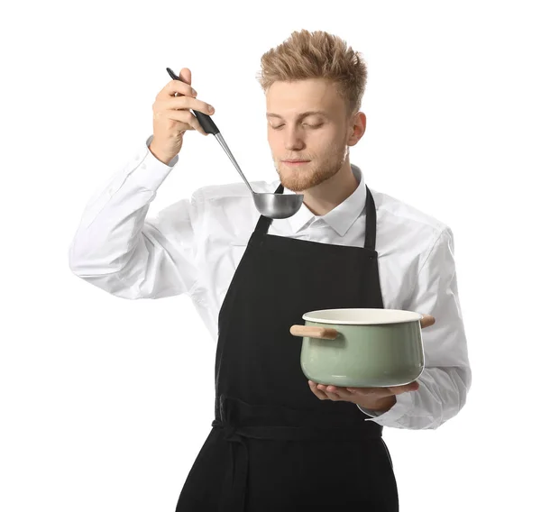 英俊的男厨师与白色背景的汤 — 图库照片