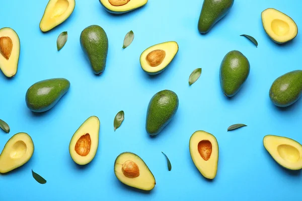 Fresh avocados on color background — Stock Photo, Image