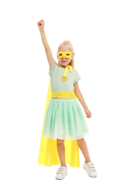 Schattig klein meisje gekleed als superheld op witte achtergrond — Stockfoto