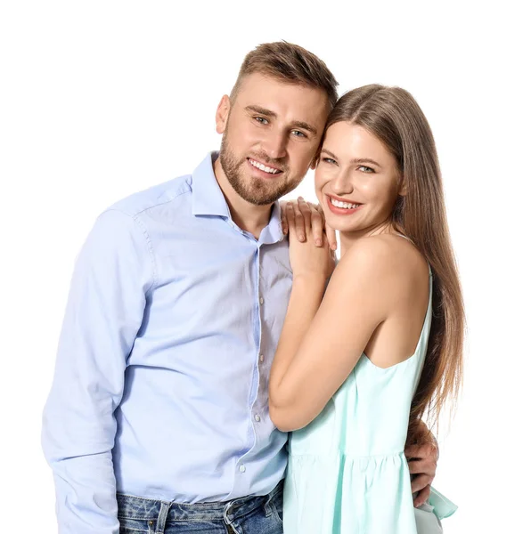 Feliz jovem casal apaixonado no fundo branco — Fotografia de Stock