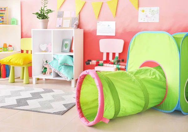 Interior of modern children's room with play tunnel — Stock Photo, Image