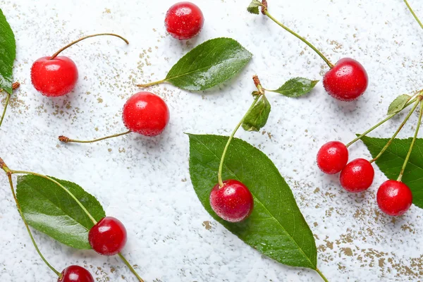 Ripe sweet cherry on light background — Stock Photo, Image