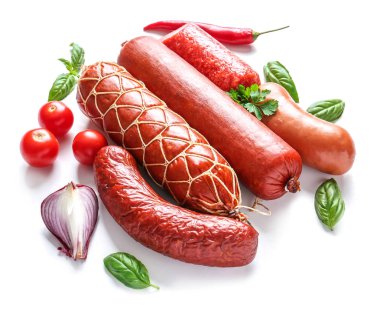 Assortment of sausages on white background clipart