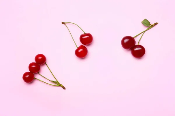 Ripe sweet cherry on color background — Stock Photo, Image