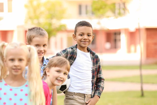 Cute little children with ball in park — Stock Photo, Image