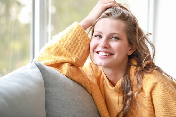 Portrait of happy young woman at home — Stock Photo, Image