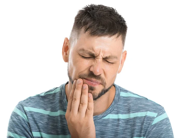 Man suffering from toothache against white background — Stock Photo, Image