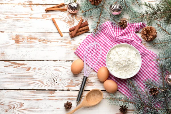 Ingredients for Christmas pie and decor on white wooden background — Stock Photo, Image