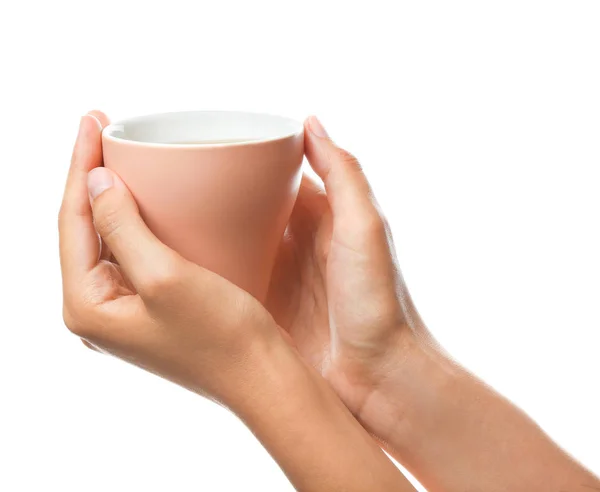 Manos femeninas con taza de té sobre fondo blanco — Foto de Stock