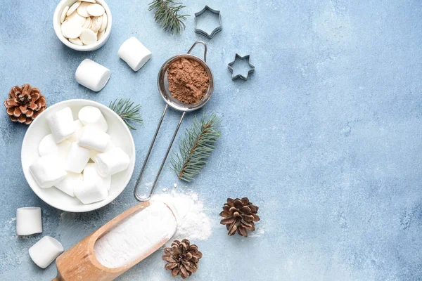 Christmas composition with cookie cutters and ingredients on color background — Stock Photo, Image