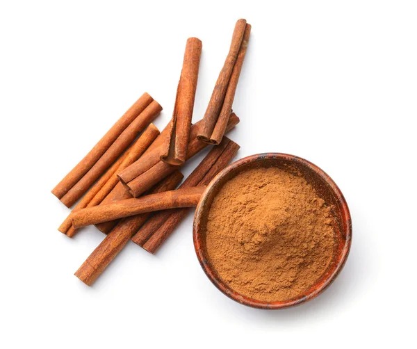 Aromatic cinnamon sticks and powder on white background — Stock Photo, Image