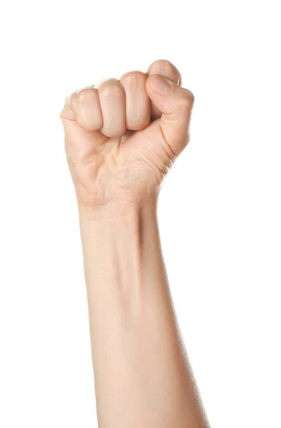 Geballte weibliche Hand auf weißem Hintergrund — Stockfoto