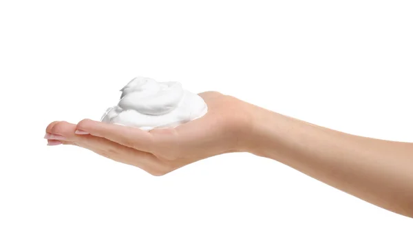 Main féminine avec savon sur fond blanc — Photo