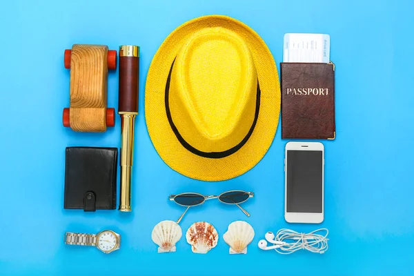 Set of items for travel on color background — Stock Photo, Image