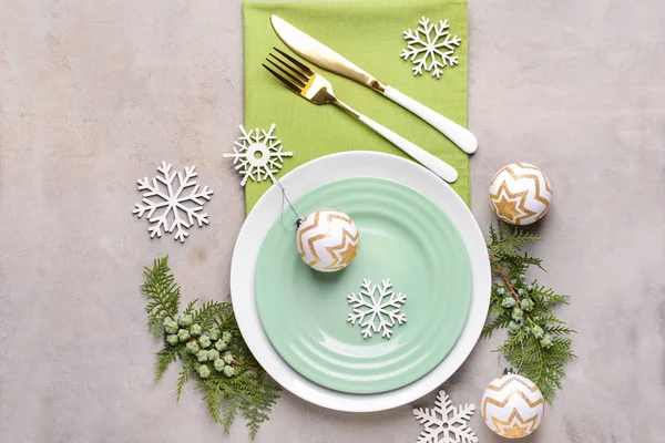 Beautiful table setting for Christmas dinner on light background — Stock Photo, Image